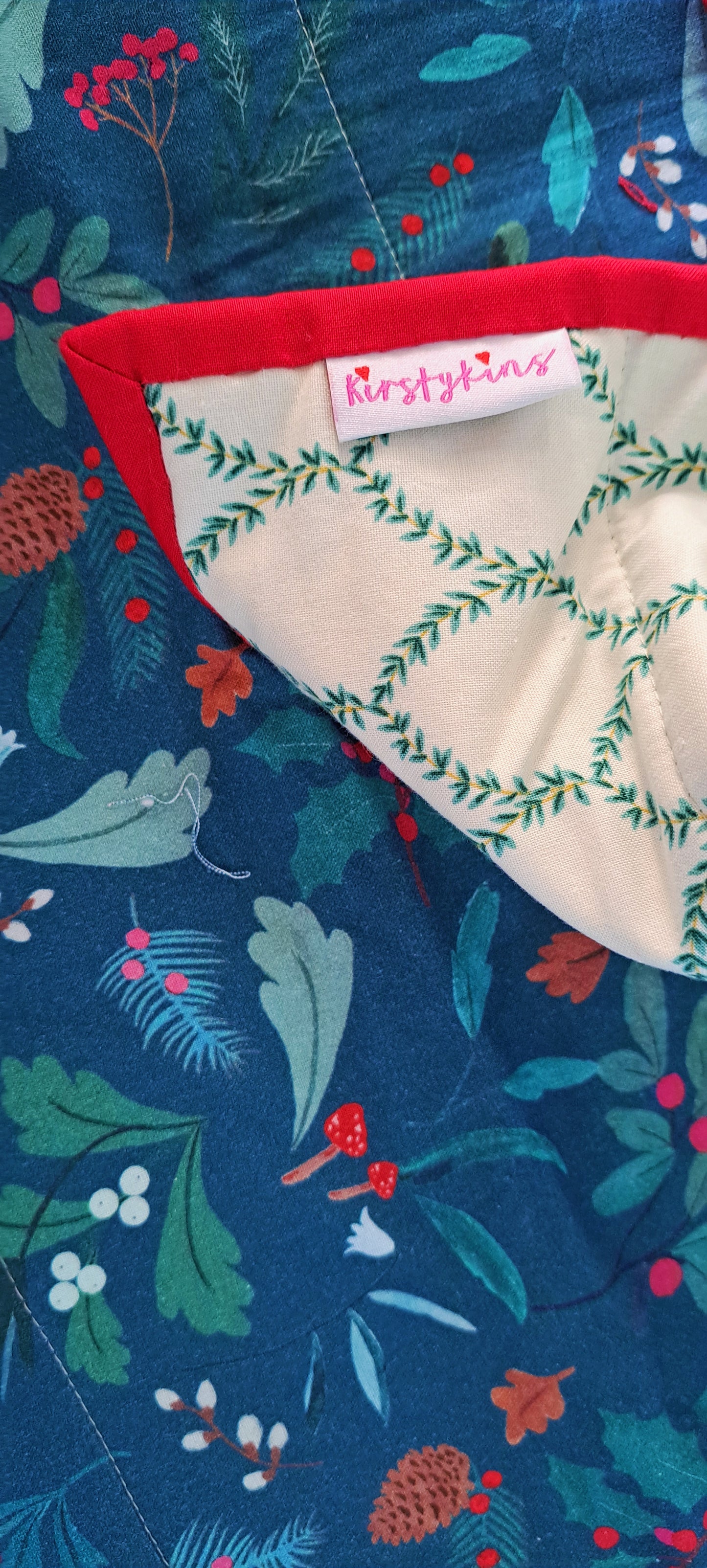 Winter Scene Joules fabric with Rifle Paper Backing and Red Binding Quilt