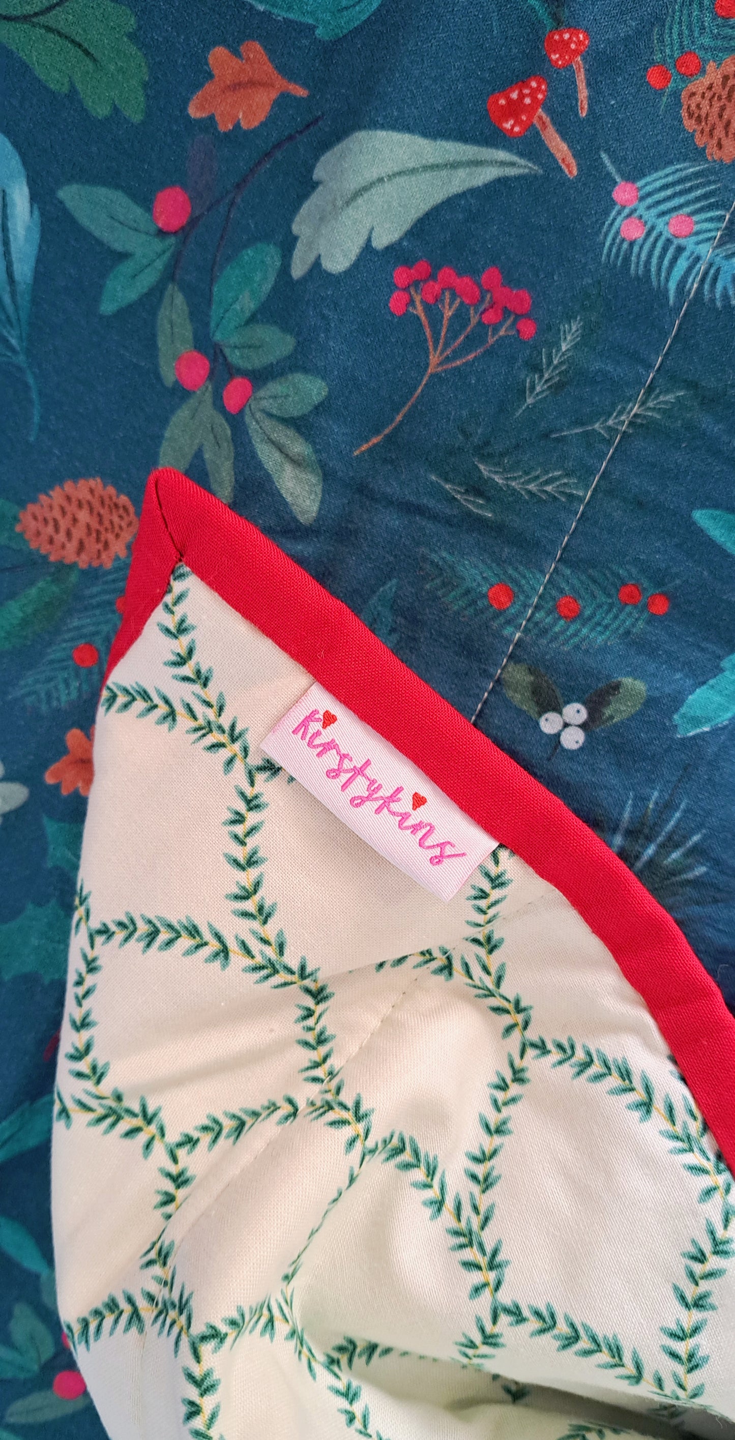 Winter Scene Joules fabric with Rifle Paper Backing and Red Binding Quilt