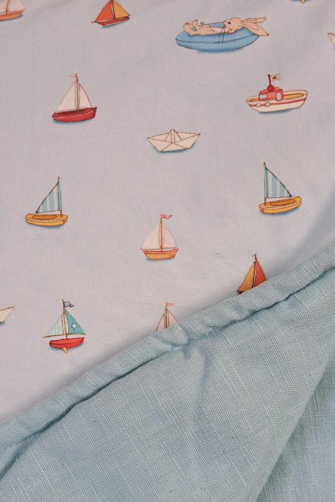 Squishy Belle and Boo Bunny in a boat and blue linen Fabric Quilt
