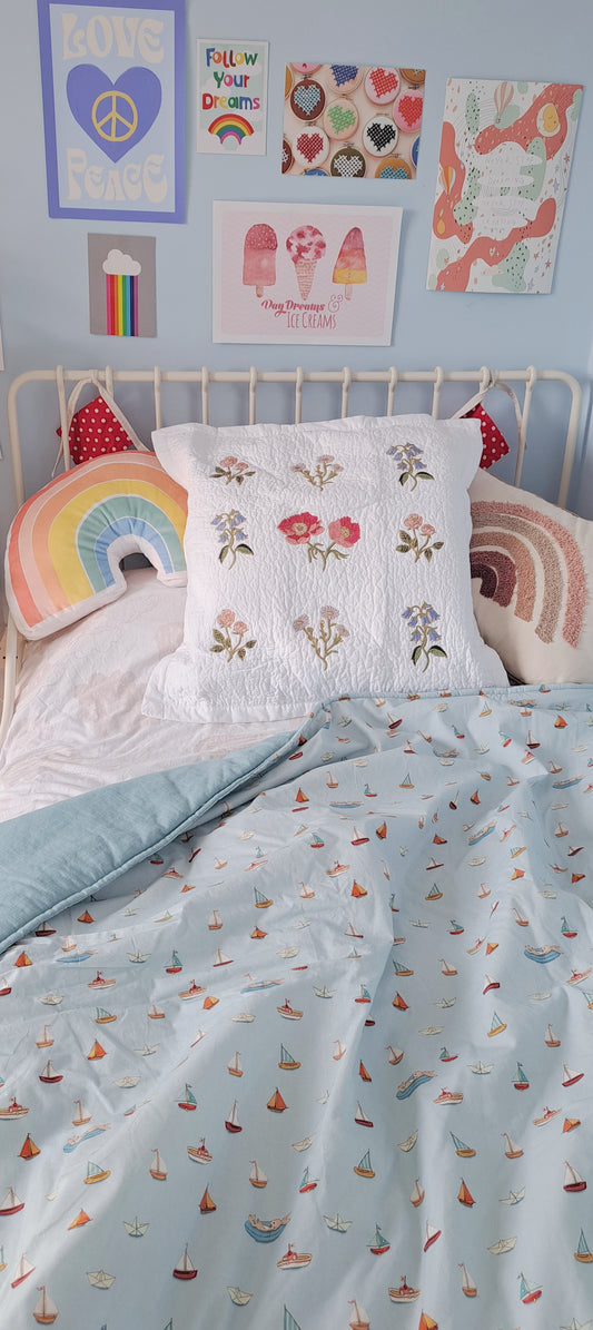 Squishy Belle and Boo Bunny in a boat and blue linen Fabric Quilt