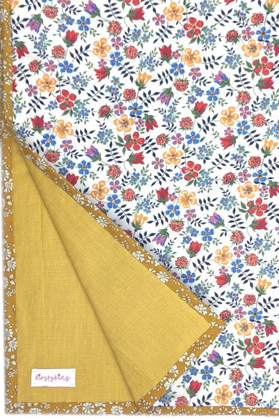 Gorgeus tana lawn fabric quilt with mustard linen backing fabric and handmade capel binding 